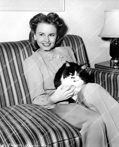 crp-18496 1944 Janet Blair & her cat Mr Tony in dressing room film Once Upon a Time crp-18496