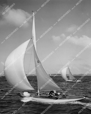 crp-01852 1950 sailing in Hamilton, Bermuda 2 Luder 16s cut through waters of Great Sound Royal bermuda Yacht Club crp-01852