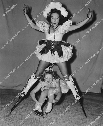 crp-01881 1944 pretty ice skaters Hazel Franklin, Phyllis Legg on stilts Ice Follies of 1945 Madison Square Garden crp-01881