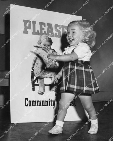 crp-02545 1948 new poster girl Anita Adcock for Community Chest visits charity headquarters crp-02545