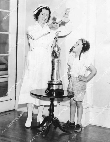 crp-02551 1934 nurse Edna Gardner Women's Air Race winner w trophy, toy airplane Clarence Johnson crp-02551