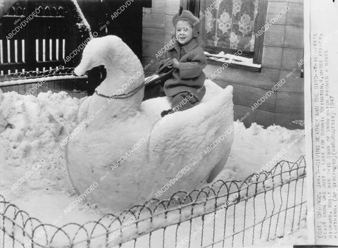 crp-02558 1947 Giving Weatherman the Bird cute Bonnie Byington on snow swan in Chicago crp-02558