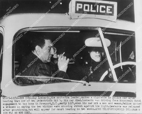 crp-03475 1951 music Guy Lombardo in police car after traffic accident crp-03475
