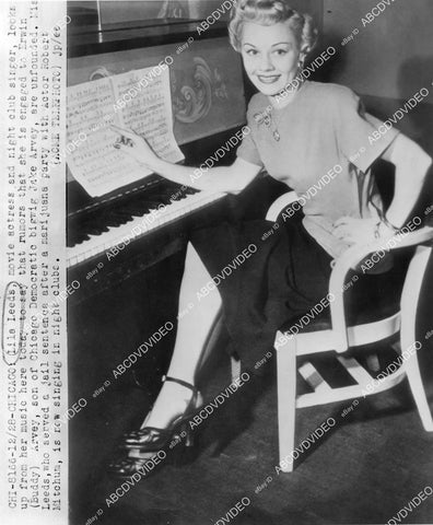 crp-03499 1949 music singer Lila Leeds at piano after arrest on marijuana w Robert Mitchum crp-03499