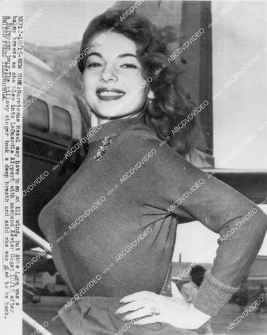 crp-03508 1954 music singer Abbe Lane busty sweater girl arrives Laguardia Airport crp-03508