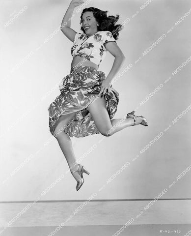 crp-03614 1945 Cuban dancer Estelita Rodriguez lifts up skirt flying through air film Mexicana crp-03614