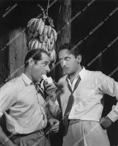 crp-03753 1935 candid Victor Jory feeds director Albert Rogell a banana film Escape from Devil's Island crp-03753