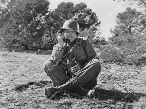 crp-03796 Chuck Connors as G.I. using field telephone unknown film crp-03796