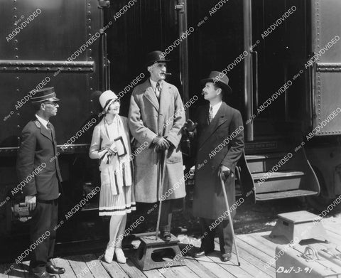 crp-04574 1928 Sally Phipps, Brandon Hurst, Cyril Ring at train station silent film News Parade crp-04574