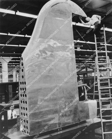 crp-04972 1944 WWII aviation Boeing assembly line new B-29 bomber rudder fin being inspected crp-04972