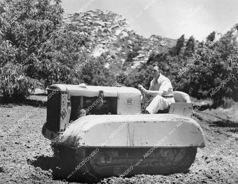 crp-05123 1941 Alexander Hall drives his tank tractor on turkey ranch in Santa Susanna, Calif crp-05123