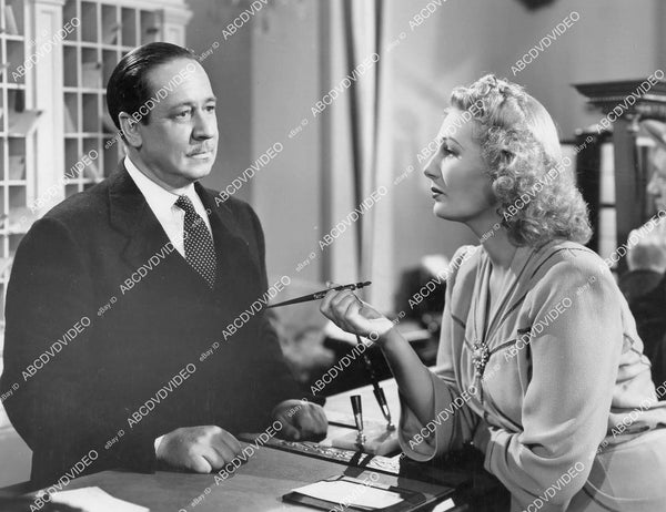 crp-05899 1941 Robert Benchley checks Binnie Barnes into hotel film Th ...