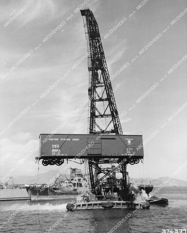 crp-05954 1953 Korean War railroad boxcar on crane barge for U.S. supply line transportation corps crp-05954