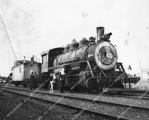 crp-05985 1940's trains some folks walking by a railroad locomotive crp-05985