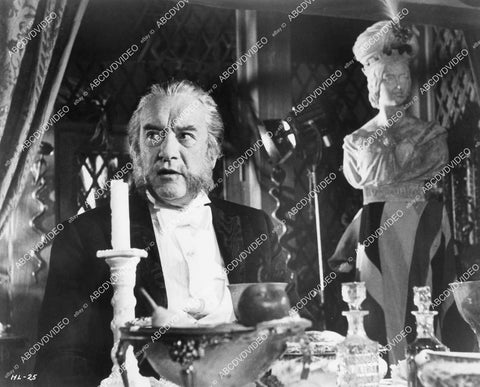crp-00646 1969 George Sanders at the dinner table film The Best House in London crp-00646