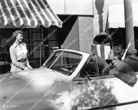 crp-06827 1951 Helen Walker greeted by Willard Parker in his convertible film My True Story crp-06827
