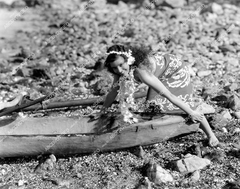 crp-07320 1931 Conchita Montenegro pushing her canoe into the water film Never the Twain Shall Meet crp-07320