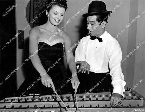 crp-07396 1943 Vivian Austin helps Fred Sanborn on the xlophone film Night Club Girl crp-07396