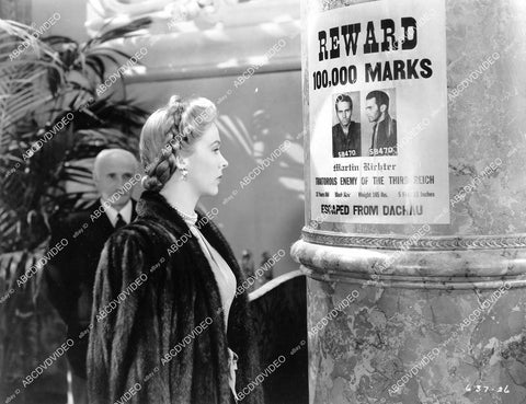 crp-07603 1945 Andrea King reads the wanted poster film Hotel Berlin crp-07603