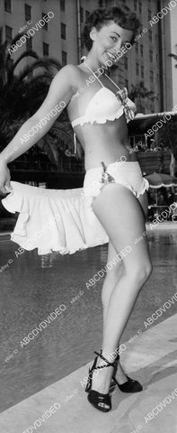 crp-08260 1950 Miss Mack Sennett of 1950 Pat Hall models new three piece bikini swimwear crp-08260