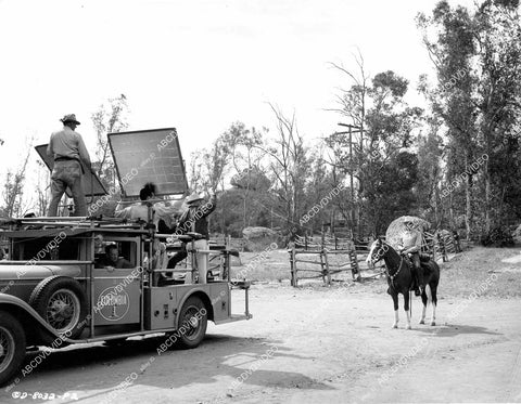 crp-08390 1951 Gene Autry and Champion behind Columbia Studios camera truck crp-08390