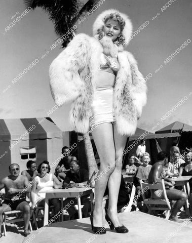 crp-08401 1948 Kathleen Stanley models new 2 piece swimwear wearing fur crp-08401