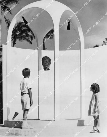 crp-00866 1965 kids admire bronze bust John F Kennedy Cape Coral Gardens Fla crp-00866