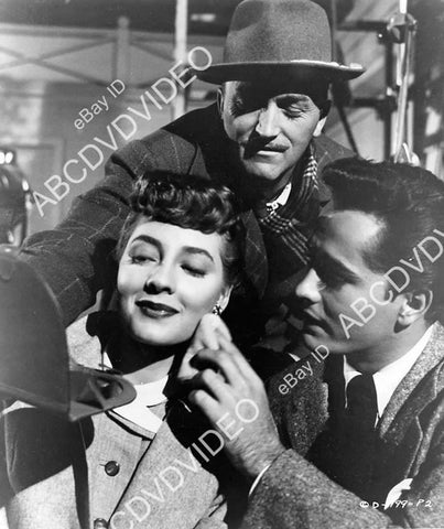 crp-09134 1951 Jody Lawrance gets help makeup man Newt Jones & John Derek on set film The Family Secret crp-09134