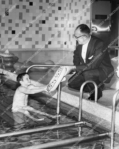 crp-00941 1950's Los Angeles Police Chief William H Parker w child in orthopedic hospital hydrotherapy pool crp-00941