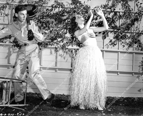 crp-09881 1945 Conrad Janis & Janis Wilson in her grass skirt film Snafu crp-09881