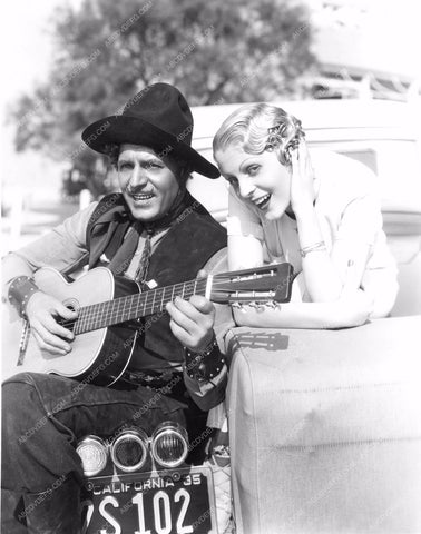 Warner Baxter and who having fun behind the scenes wbax-33